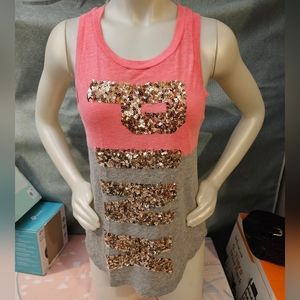 Pink tank top with glittery letters. Size xs